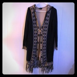 Long sweater with hood and Aztec-like print